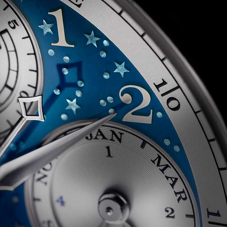 The engraved stars beneath the deep-blue enamel on the 1815 RATTRAPANTE PERPETUAL CALENDAR HANDWERKSKUNST in close-up.